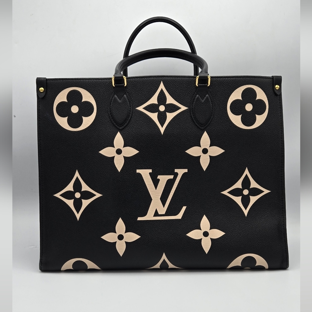 Louis Vuitton OnTheGo MM Giant Monogram Empreinte Leather Tote – Black & Cream